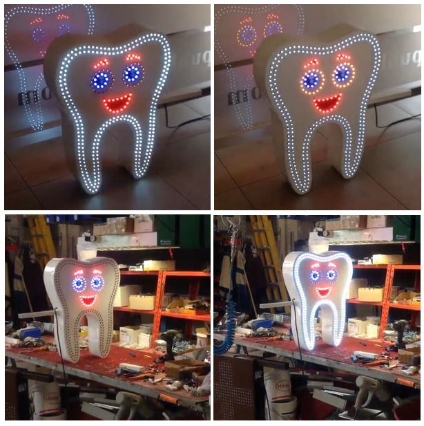 Необычный зуб для вывески стоматология